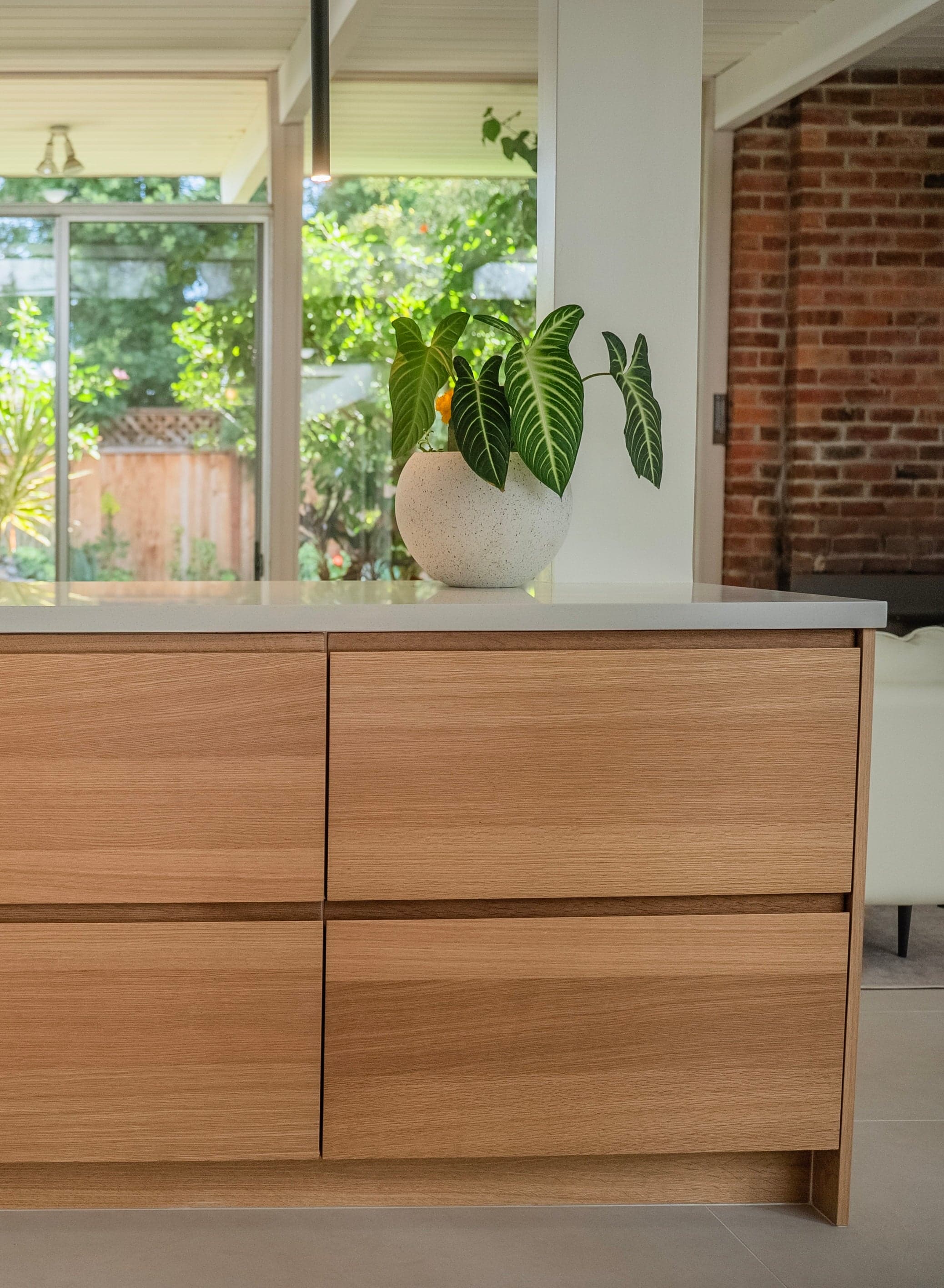 Panel-ready appliances integrated with matching white oak veneer